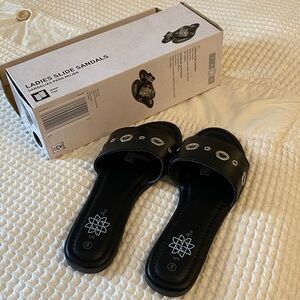 Serra Black Slide Sandals with Silver Accents